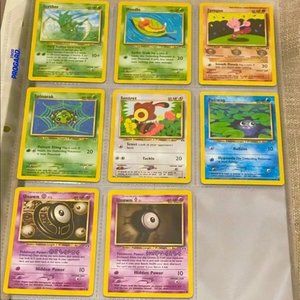 Pokémon Neo Discovery cards, set of 8 including Uncommon Scyther card.